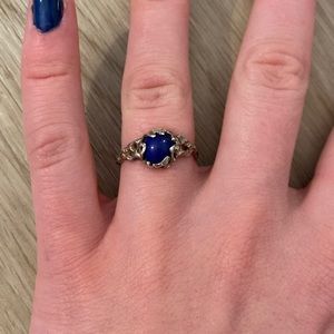 Sterling silver ring with blue gem